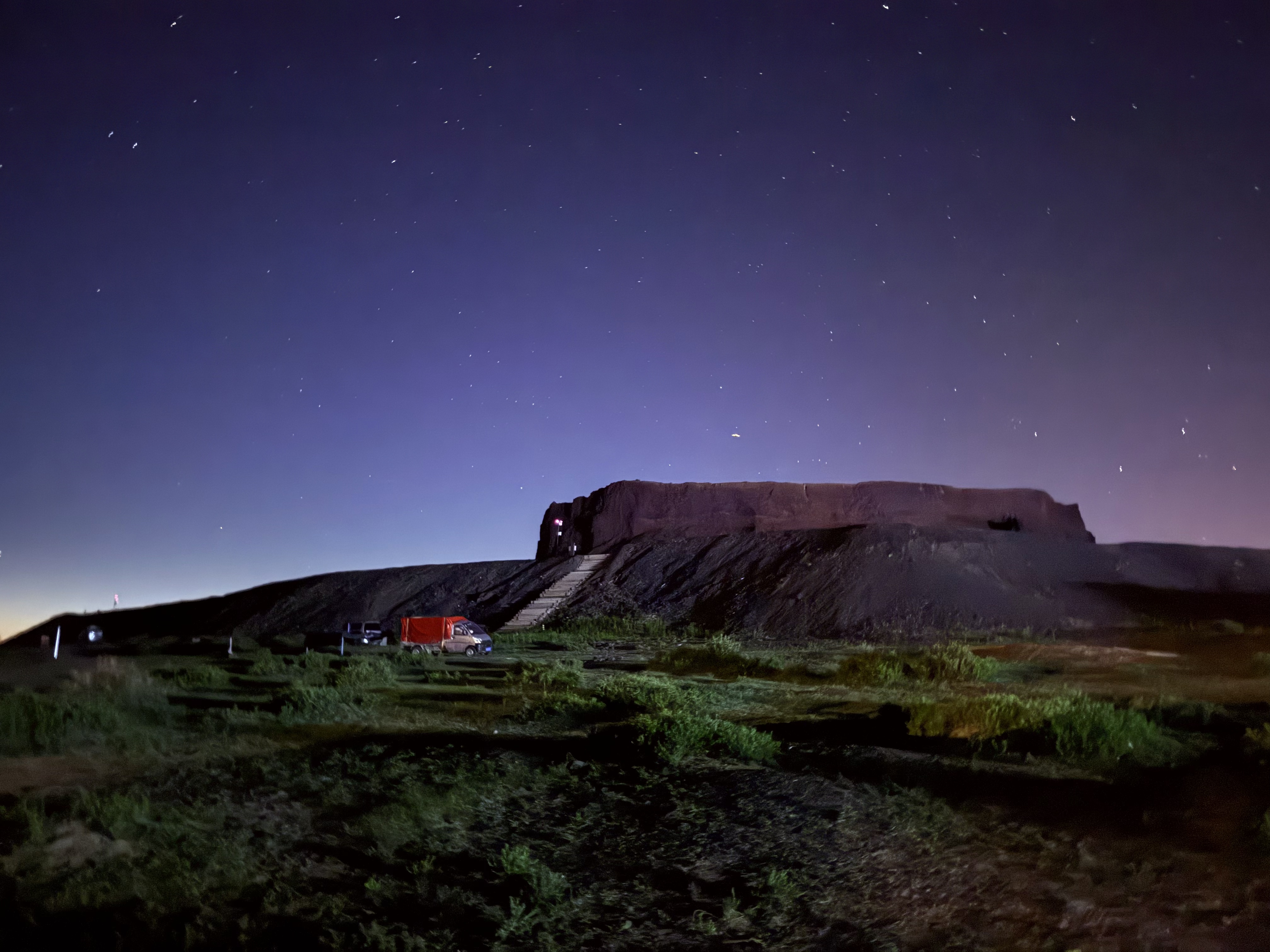 Night sky full of stars over ruins